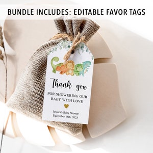 May include: A white favor tag with a green, orange, and yellow dinosaur illustration. The tag says "Thank you for showering our baby with love" and includes the date "December 18th, 2023".