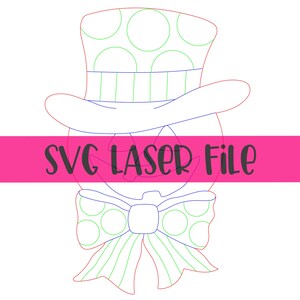 May include: A whimsical design featuring a top hat with polka dots and a bow tie, outlined in red, green, and blue. The text "SVG LASER File" is displayed on a pink banner across the design. The image is set against a white background.