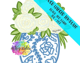 May include: A white door hanger template featuring a blue and white patterned vase with white flowers and green leaves. The text "DOOR HANGER TEMPLATE BLACK AND WHITE JPG. PDF" is written in black text on a blue background.