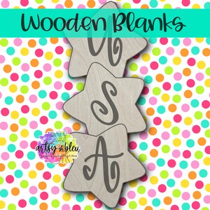 May include: Three wooden star-shaped blanks with the letters "USA" in a dark gray script. The background is a colorful pattern of polka dots in various colors. The words "Wooden Blanks" are written in black script at the top.