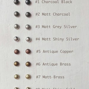 May include: Eight different metal finishes for jewellery making, including charcoal black, matt charcoal, matt grey silver, matt shiny silver, antique copper, antique brass, matt brass, and matt shiny gold.