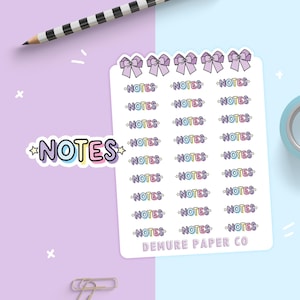 May include: A sheet of colorful "NOTES" stickers with a bow design. The stickers are on a white background with the text "DEMURE PAPER CO" at the bottom.