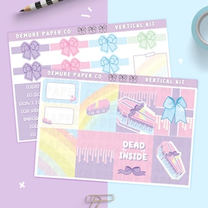 May include: A set of pastel pink, blue, and yellow planner stickers with a rainbow background. The stickers feature a coffin with stars, a coffin with a bow, a dripping coffin, a bow, and the text "Dead Inside".