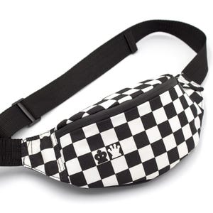 May include: Black and white checkered fanny pack with a black adjustable strap and a small logo on the front.