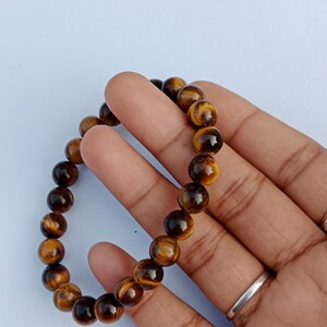 Close-up of genuine Tiger Eye gemstone bracelet