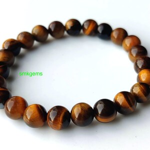 Brown Tiger Eye crystal bracelet on white background