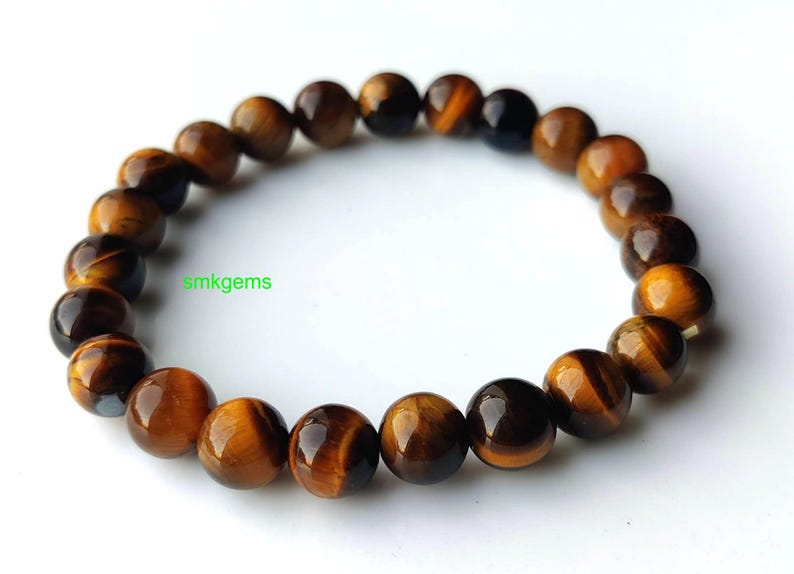 Brown Tiger Eye crystal bracelet on white background