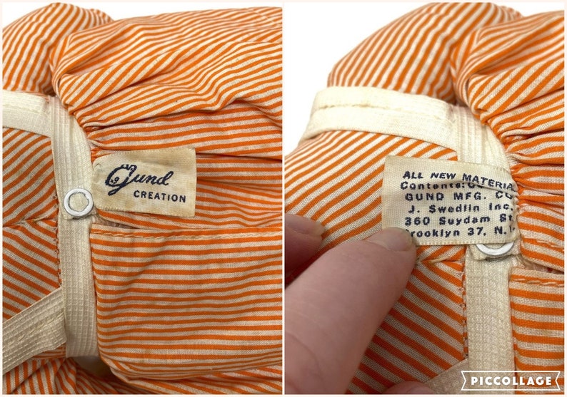 Op de afbeelding: Oranje en wit gestreepte stoffen pop met een Gund Creation-label en een label met de tekst "ALL NEW MATERIAL Contents: Cotton, Polyester, QUND MFG. CO. J. Swedlin Inc. 360 Suydam St. Brooklyn 37. N."