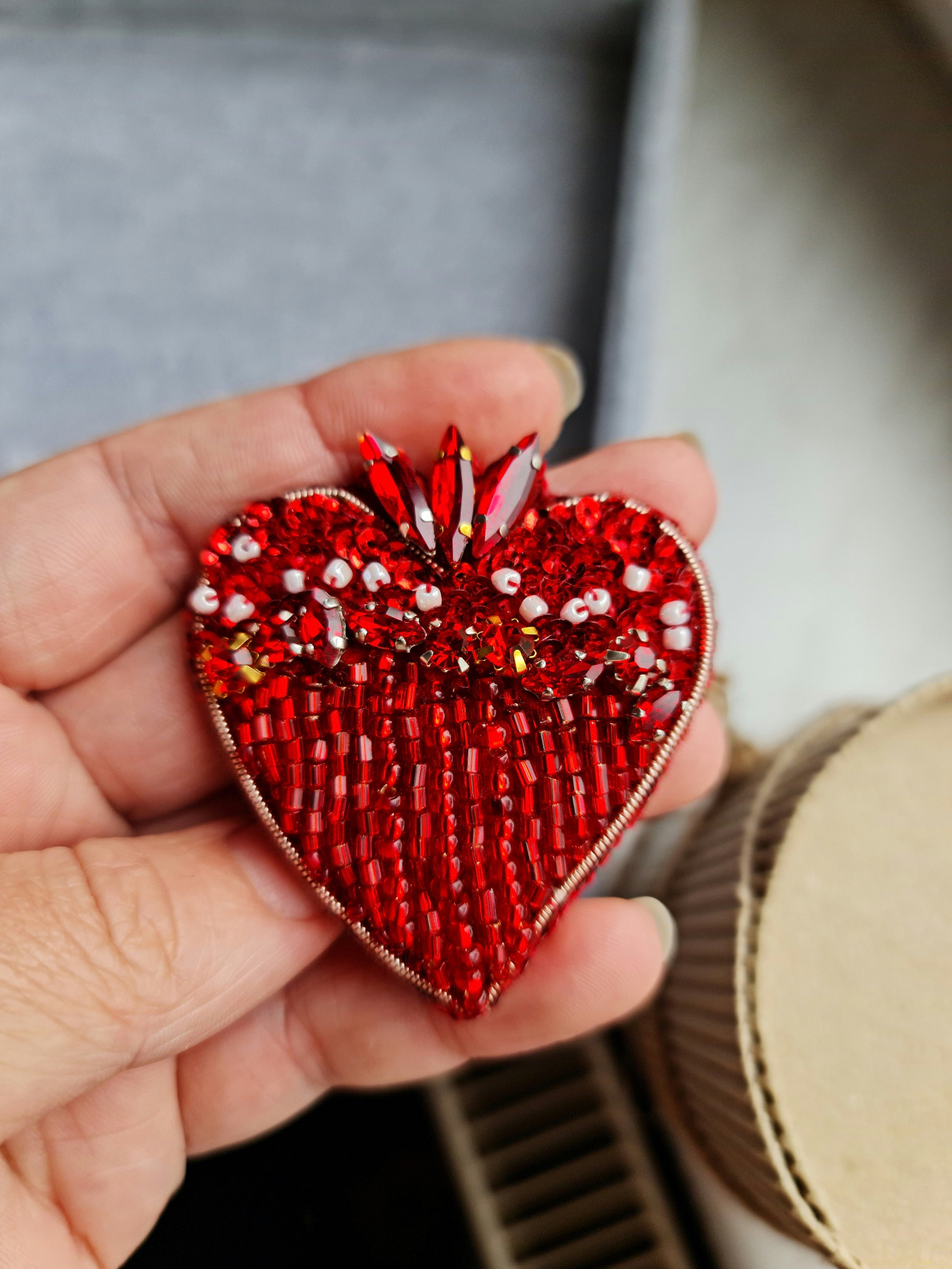 Red outlet heart brooch