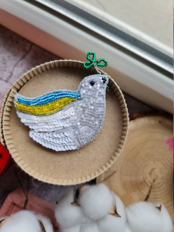 Dove of peace best sale brooch