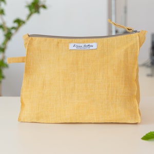 Large linen cosmetic bag with zip-fastener, linen makeup bag, toiletry storage, makeup organizer handmade from canary yellow natural linen
