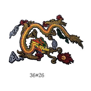 May include: Embroidered iron-on patch featuring a colorful dragon with gold accents. The dragon is curled around itself with its head facing the left. The patch is 36 inches by 26 inches.