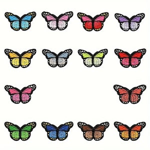 May include: Assortment of 15 colorful butterfly iron-on patches. The patches feature butterflies in various colors, including blue, pink, yellow, red, green, and purple.