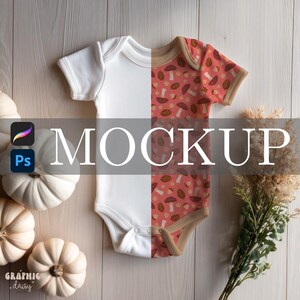 May include: A white and patterned baby onesie mockup. The right side features a peach background with a mushroom and leaf pattern. The left side is plain white. The word "MOCKUP" is across the center. White pumpkins and dried flowers are in the background.