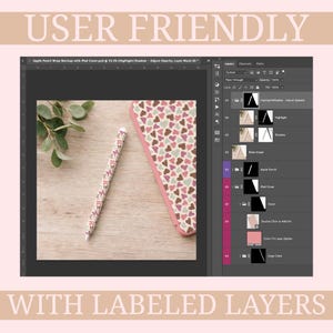 May include: An iPad cover, Apple Pencil, and digital design software interface are displayed on a wooden surface. The iPad cover and Apple Pencil have a heart pattern in pink, brown, and green. The text "USER FRIENDLY" and "WITH LABELED LAYERS" are at the top and bottom.