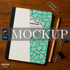 May include: A composition book with a teal daisy pattern and the text "MOCKUP" overlaid. A pencil, paper clips, and binder clips are arranged on a wooden surface. The book has a black spine and a white cover.