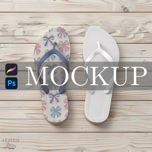 May include: A pair of flip-flops, one with a bow pattern in pink and blue on a beige background, the other solid white. The word "MOCKUP" is displayed in large white letters. The background is light wood.
