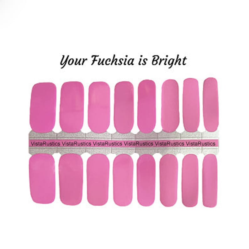 May include: Fuchsia-colored nail polish strips with the text "Your Fuchsia is Bright" and the brand name "VistaRustics". The strips are arranged in two rows, with varying sizes for different nail shapes. The background is white.