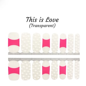 May include: Nail polish wraps with a white background and pink accents. The design features a row of white hearts and a row of pink stripes. The text "This is Love (Transparent)" is printed above the nail wraps.