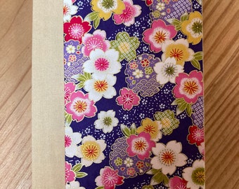 Floral notebook on a blue background (A6 format)