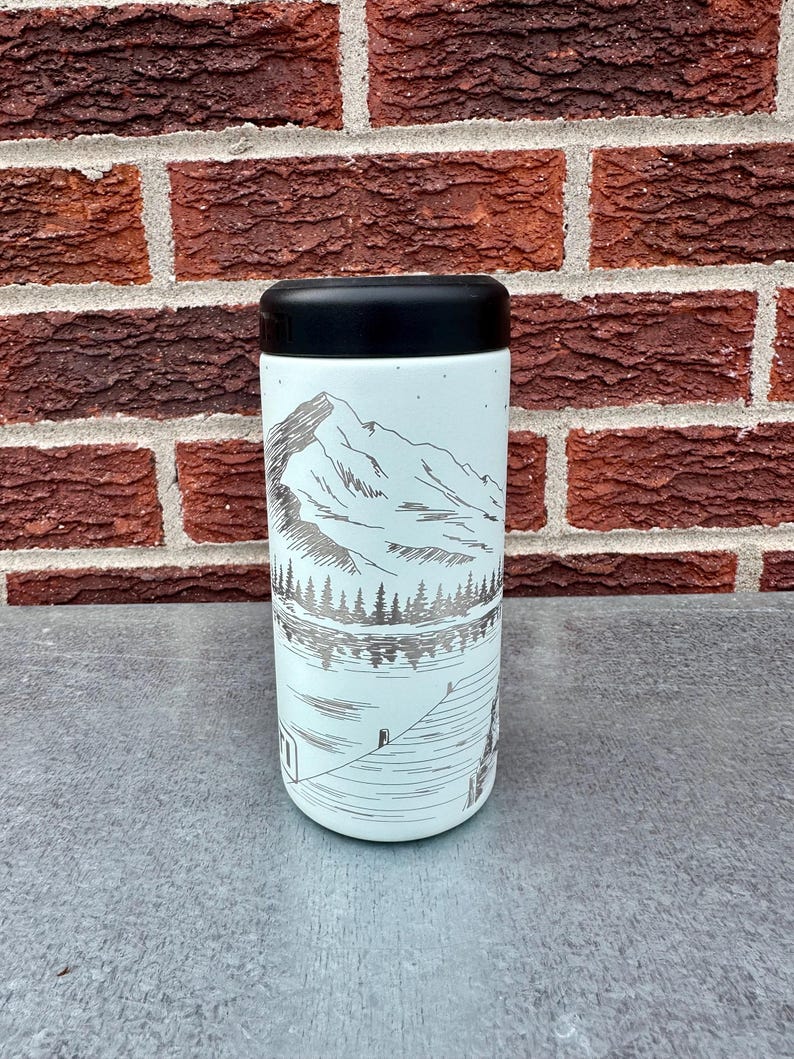 May include: A set of three ceramic mugs with a speckled, matte finish in cream, light grey, and dark grey. Each mug has a minimalist design, ideal for tea or coffee.