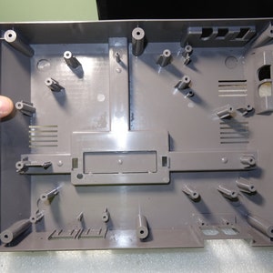 Nintendo NES Nes-001 Side Loader - Empty Bottom Case ONLY-Just OK Cosmetic-Mild Fade/Darkening