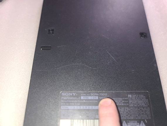 PS2 Slim SCPH-70012 Black Bottom Empty Case ONLY-Just OK Cosmetic Condition-Mark, Scratches & Worn Label