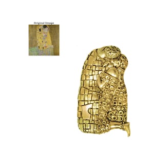 May include: Gold-colored metal sculpture of two figures embracing, inspired by Gustav Klimt's "The Kiss" painting. The sculpture is made of interlocking puzzle pieces.