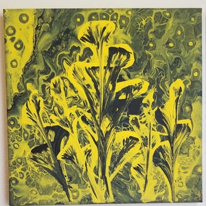 May include: Abstract painting with black and yellow paint. The painting features a design of stylized plants with long, thin leaves.