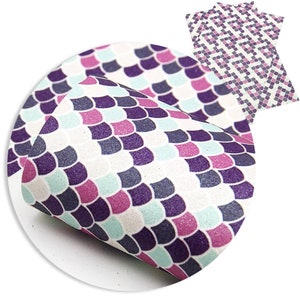 May include: Purple, pink, and blue patterned faux leather sheet with a white background. The pattern resembles fish scales.
