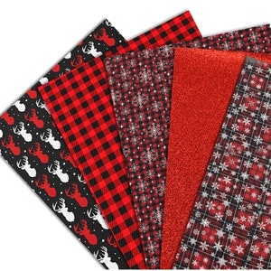 May include: A set of five red and black patterned fabric sheets. The patterns include a red and black plaid, a red and black snowflake pattern, a solid red glitter fabric, and two different red and black reindeer patterns.