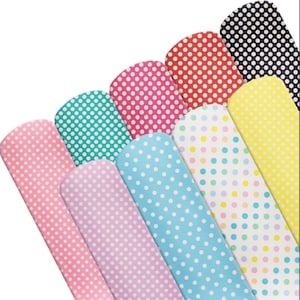 May include: A set of eight fabric sheets with different polka dot patterns. The patterns include pink, teal, light blue, lavender, yellow, light blue with white dots, red with white dots, and black with white dots.