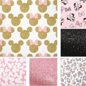 May include: A set of nine fabric swatches featuring different patterns. The swatches include a white fabric with gold glitter Mickey Mouse heads, a pink fabric with black polka dots and white Mickey Mouse heads, a pink fabric with black glitter, a black fabric with silver glitter, a white fabric with black and gold leopard print and pink glitter Mickey Mouse heads, and a pink fabric with white polka dots and black Mickey Mouse heads.