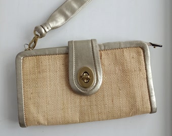 COACH Beidge Paper and Bronze pochette portefeuille à bracelet en cuir