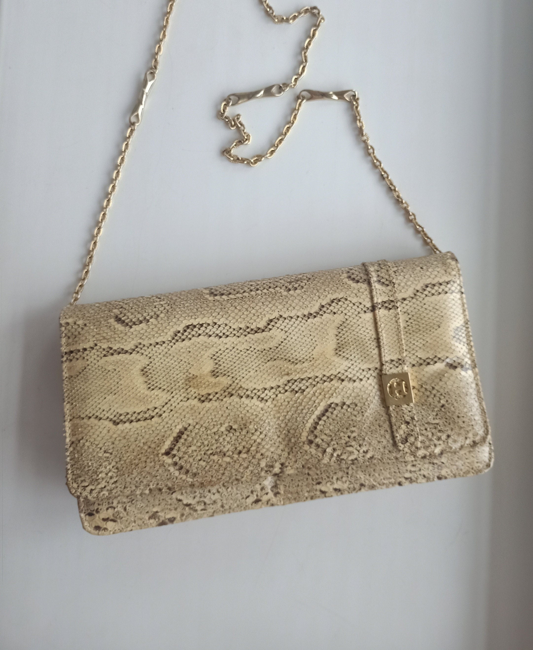 Beige snakeskin clutch bag hotsell
