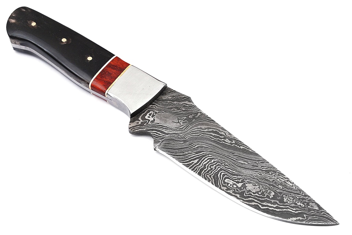 Coltello survival a lama fissa damasco