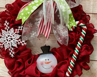 Christmas wreath with red burlap