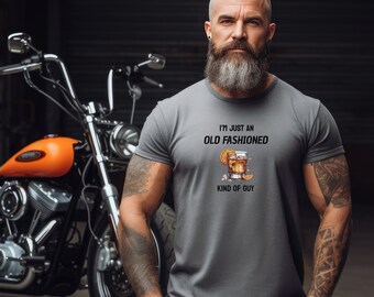 May include: A grey t-shirt with the text "I'm just an old fashioned kind of guy" and a graphic of an old fashioned cocktail.