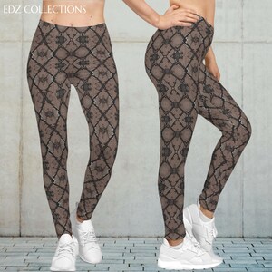 May include: Brown and black patterned leggings. The leggings feature a repeating geometric design. The model is wearing white sneakers. The leggings are form-fitting and reach the ankles. The brand name "EDZ COLLECTIONS" is visible at the top.