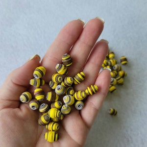 Autumn paper beads to make handmade jewelry, recycled paper beads
