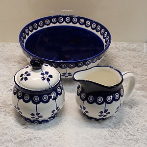 A Blue And White Bowl    A Stoneware Pitcher    A Sugar Bowl With A Lid      Stoneware Bowl Also Functions Well As A Serving Bowl