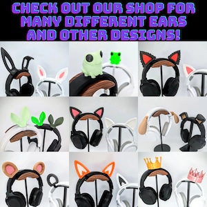 May include: A collection of nine different headphone stands with various ear designs. The stands are made of wood and metal and feature a variety of ear designs, including bunny ears, frog ears, cat ears, dog ears, fox ears, and crown ears. The stands are all black and white and have a modern design.