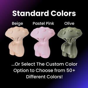 May include: Three ceramic mushroom figurines in beige, pastel pink, and olive green. The text "Standard Colors" is above the figurines, and the text "Beige", "Pastel Pink", and "Olive" are below each figurine. The text "...Or Select The Custom Color Option to Choose from 50+ Different Colors!" is below the figurines.