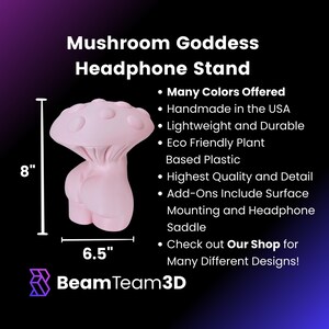 May include: A pink mushroom-shaped headphone stand, 8 inches tall and 6.5 inches wide. The stand is made of eco-friendly plant-based plastic and is handmade in the USA. It features a mushroom cap with white dots and a rounded base. The stand is designed to hold headphones securely and is available in many colors.