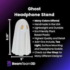May include: White ghost-shaped headphone stand, 8.25 inches tall and 5 inches wide.  The stand is made of eco-friendly plastic and is handmade in the USA.  It features a light surface mounting and headphone saddle.  The text "Our Shop" is included in the image.