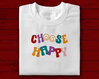May include: White sweatshirt with the text "Choose Happy" in colorful, retro-style letters. The letters are outlined in black and have a 3D effect.