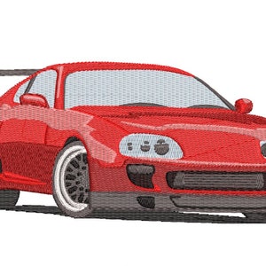 May include: A red sports car with a spoiler, black wheels, and a black front grille.