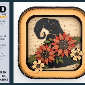 Può includere: Un design in legno a strati con un cappello da strega nero e girasoli colorati. Il design è racchiuso in un quadrato. Il testo recita "MY 3D laser" e "LAYERED CUT FILE FOR LASERS".
