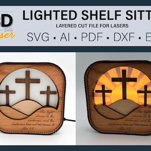 May include: A wooden lighted shelf sitter with three crosses and the text "The light shines in the darkness, and the darkness has not overcome it. John 1:5". The design is a layered cut file for lasers.