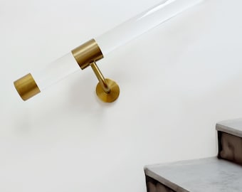Custom sized round acrylic stair handrails, round clear acrylic handrails, brass coloured handrail brackets, round handrails.